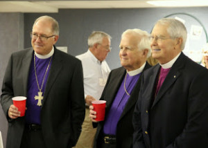 Bishops Mayer, Hulsey and High at the reception following the election of Mayer as fourth provisional bishop of the diocese.